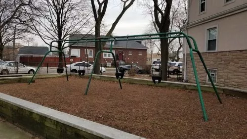 North Mayfair park contains a small playground with lots of shade and seating