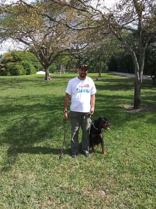 Juan and his team: Melissa, Marco, and Yessy are professional canine trainers and caretakers